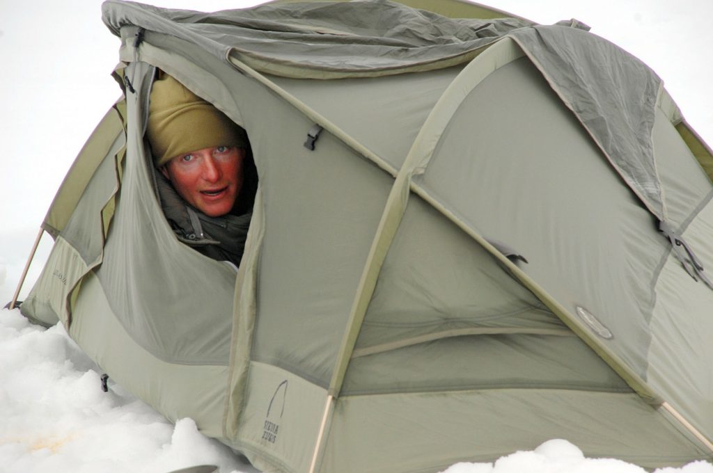 Packing a small tent to take with you is the way to go for camping out in winter